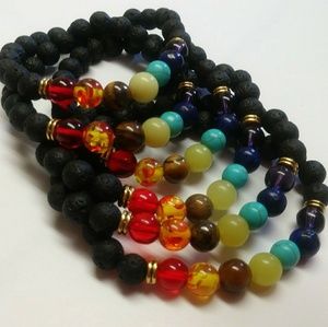 6 Glass and lava beads 7 chackra elastic bracelets